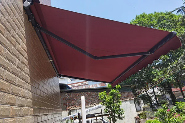 FB Original Folding Arm Awning shading an outdoor area